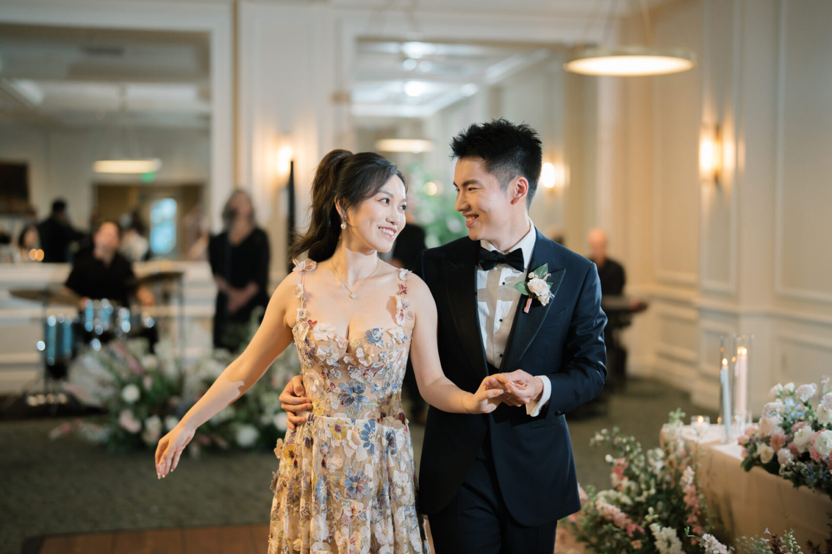 Asian couple dancing at their wedding